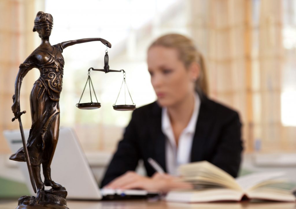 Attorney reviewing slip and fall case documents
