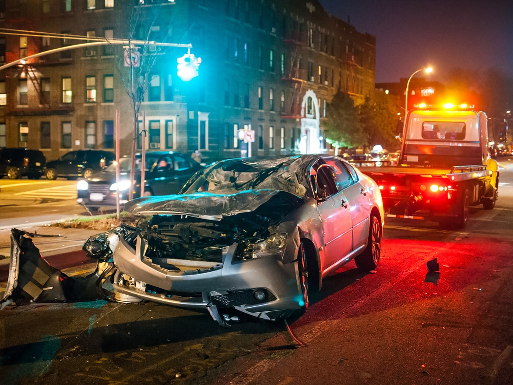 Car crash scene with emergency response